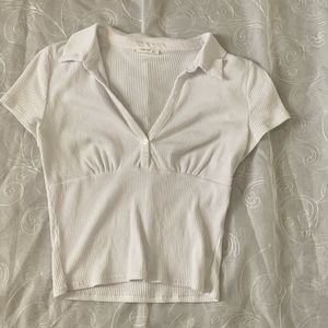 Cropped white polo shirt